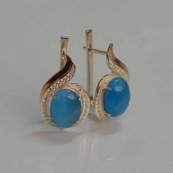 Срібні сережки з золотими вставками