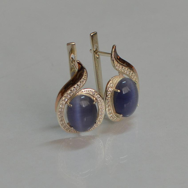 Срібні сережки з золотими вставками