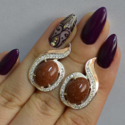 Срібні сережки з золотими вставками