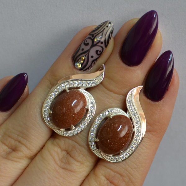 Срібні сережки з золотими вставками