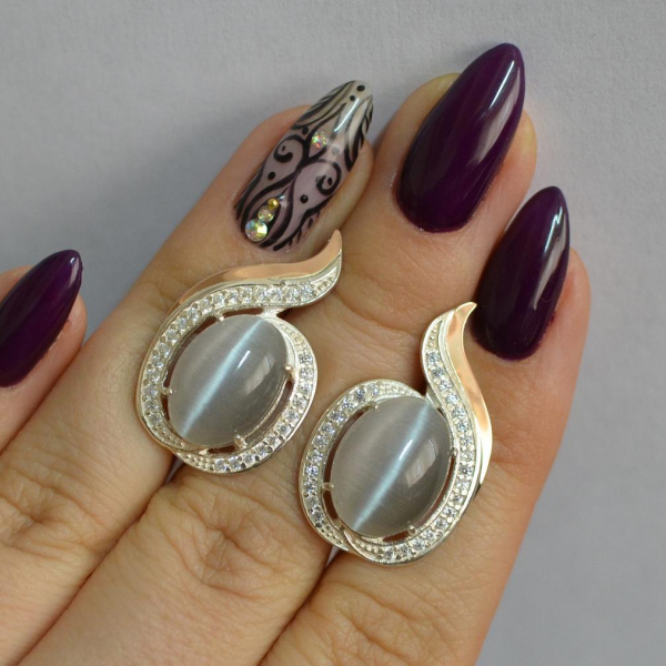 Срібні сережки з золотими вставками