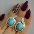 Срібні сережки з золотими вставками