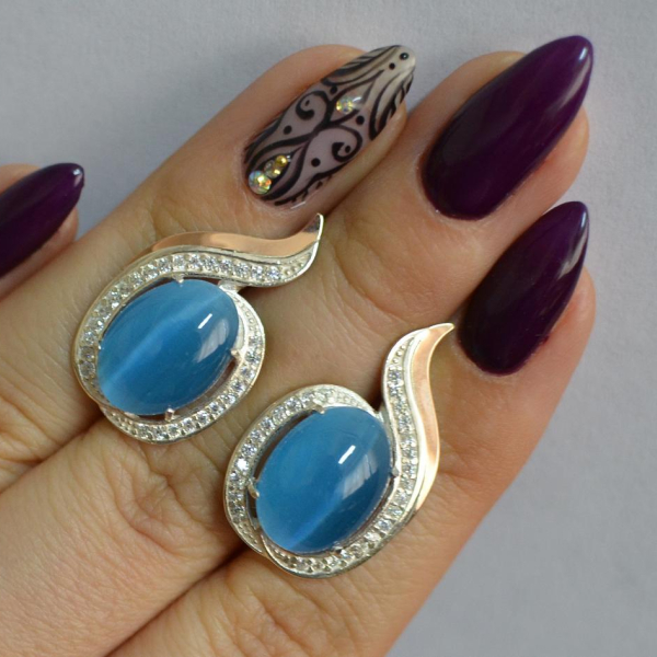 Срібні сережки з золотими вставками