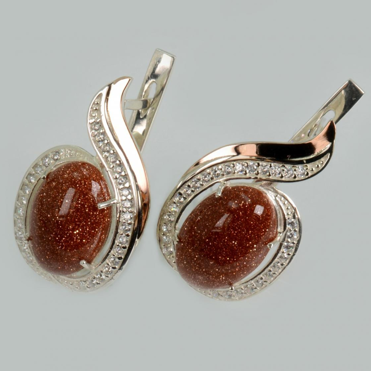 Срібні сережки з золотими вставками