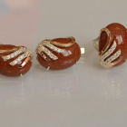 Срібний набір з золотими пластинами