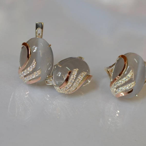 Срібний набір з золотими пластинами