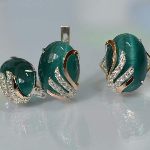 Срібний набір з золотими пластинами