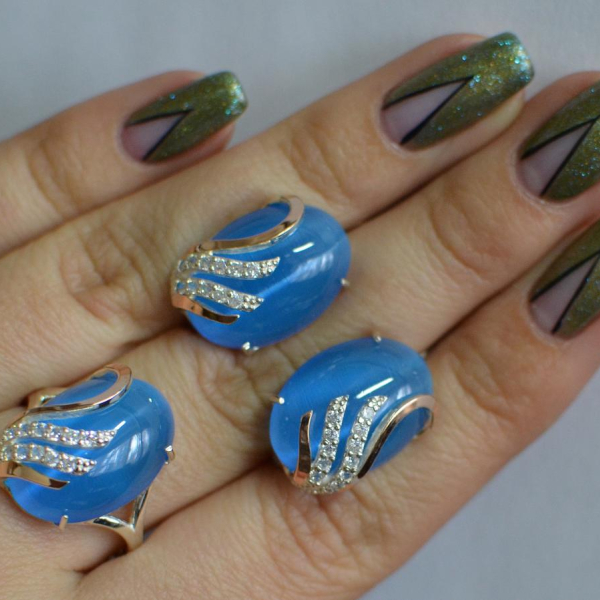 Срібний набір з золотими пластинами