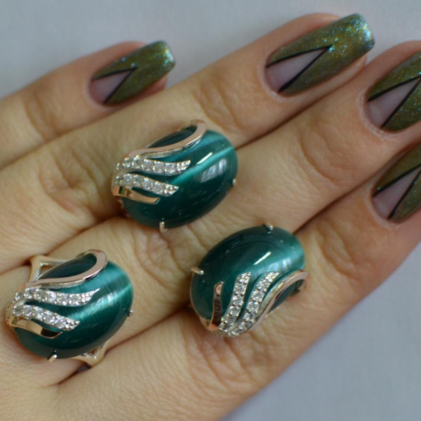 Срібний набір з золотими пластинами