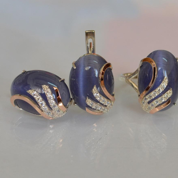 Срібний набір з золотими пластинами