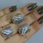 Срібний набір з золотими пластинами