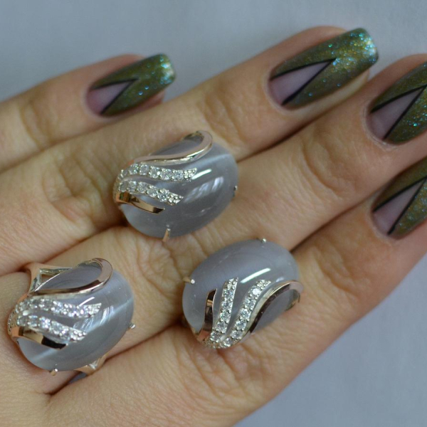 Срібний набір з золотими пластинами