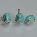 Срібний набір з золотими пластинами