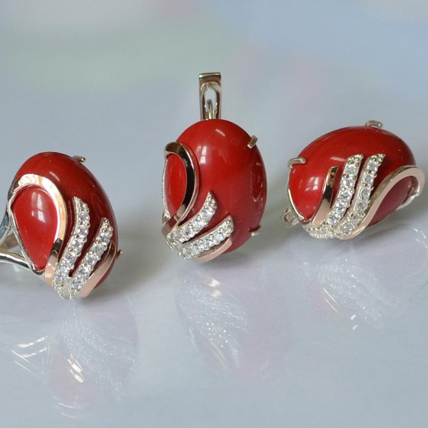 Срібний набір з золотими пластинами