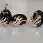 Срібний набір з золотими пластинами