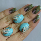 Срібний набір з золотими пластинами