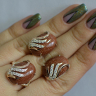 Срібний набір з золотими пластинами