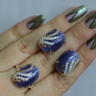 Срібний набір з золотими пластинами