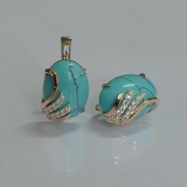 Сережки із срібла з золотом