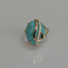 Каблучка із срібла з золотими вставками