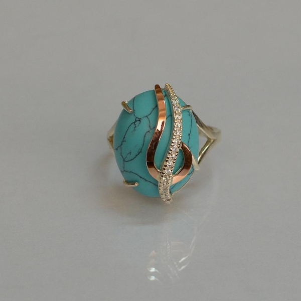 Каблучка із срібла з золотими вставками