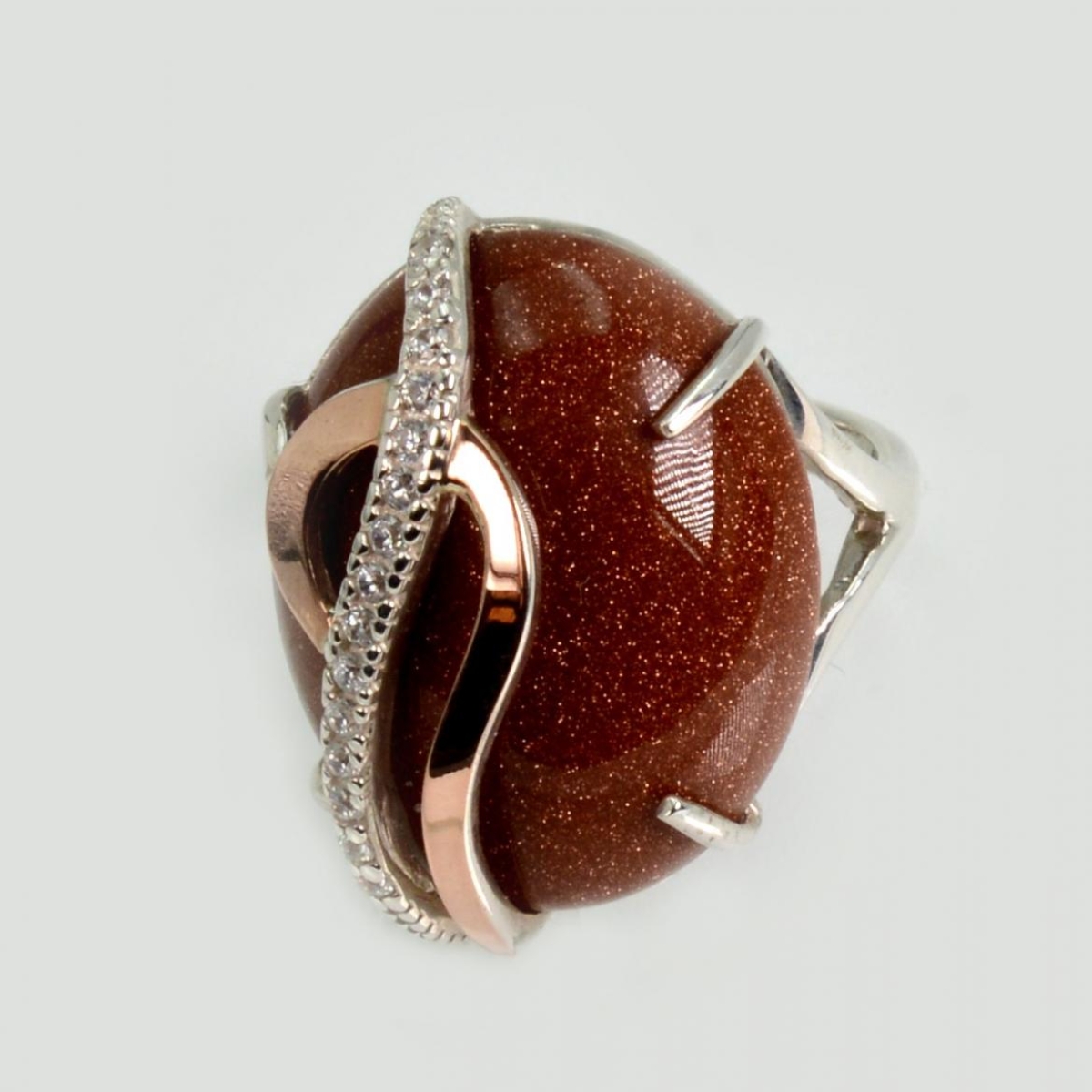 Каблучка із срібла з золотими вставками