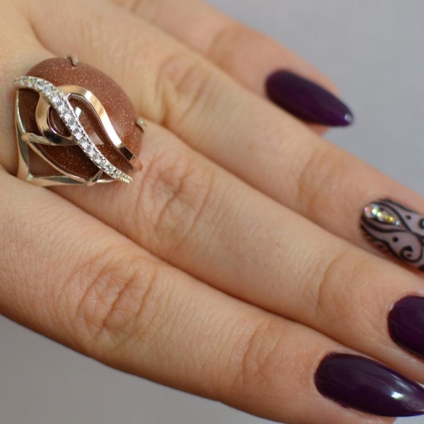 Каблучка із срібла з золотими вставками