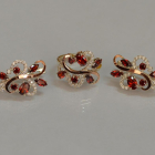 Срібний набір з золотими пластинами