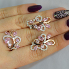 Срібний набір з золотими пластинами