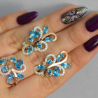 Срібний набір з золотими пластинами