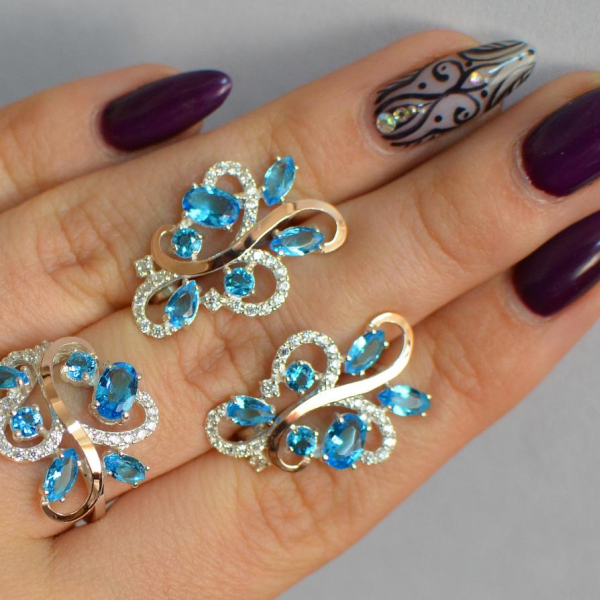 Срібний набір з золотими пластинами