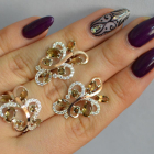 Срібний набір з золотими пластинами