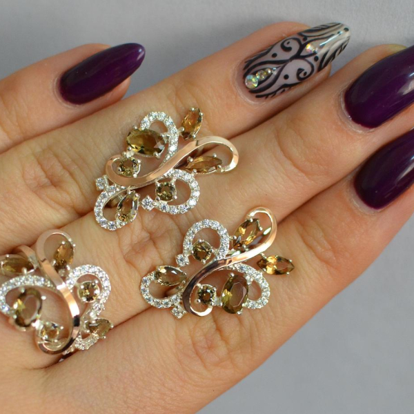 Срібний набір з золотими пластинами