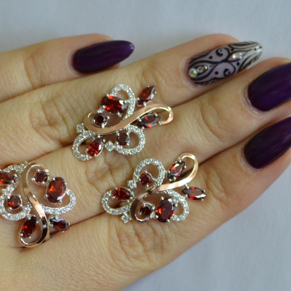 Срібний набір з золотими пластинами