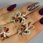 Срібний набір з золотими пластинами