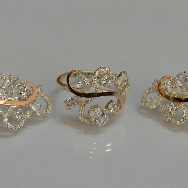 Срібний набір з золотими пластинами