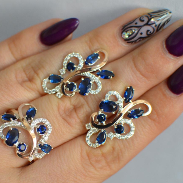 Срібний набір з золотими пластинами