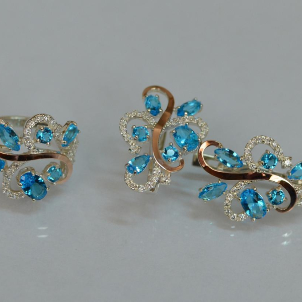 Срібний набір з золотими пластинами