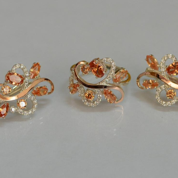 Срібний набір з золотими пластинами