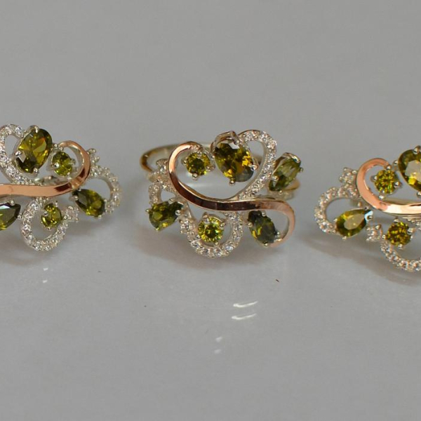 Срібний набір з золотими пластинами