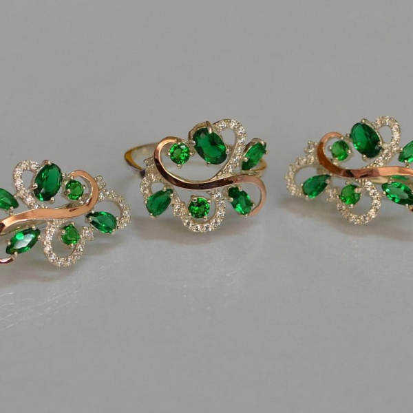 Срібний набір з золотими пластинами