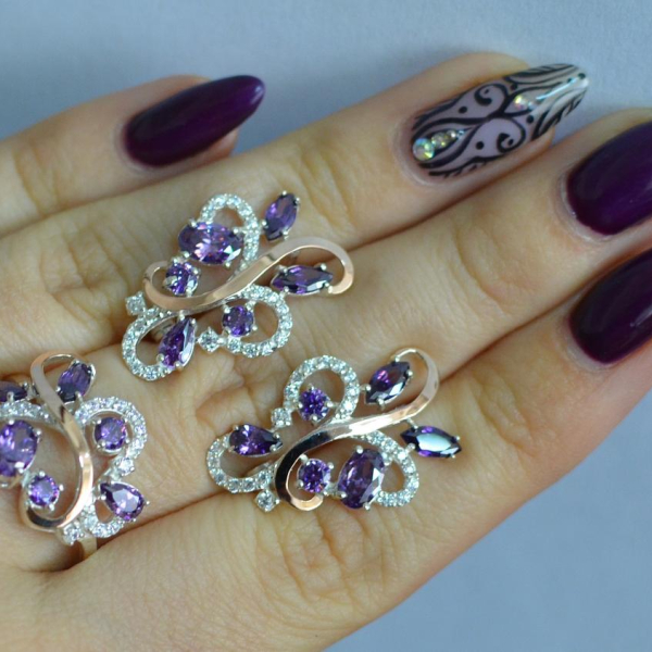 Срібний набір з золотими пластинами