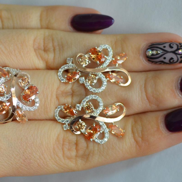 Срібний набір з золотими пластинами