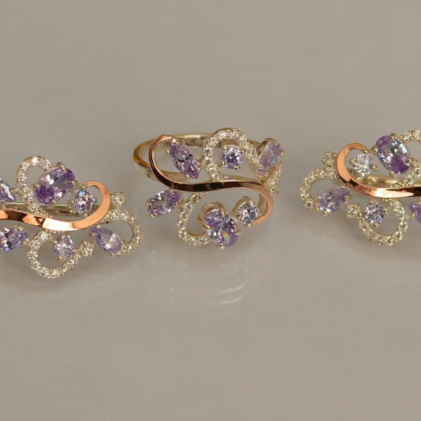 Срібний набір з золотими пластинами