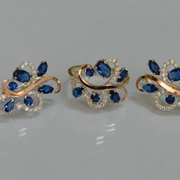 Срібний набір з золотими пластинами