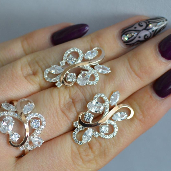 Срібний набір з золотими пластинами