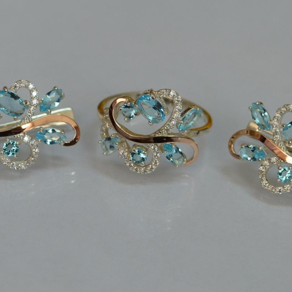 Срібний набір з золотими пластинами