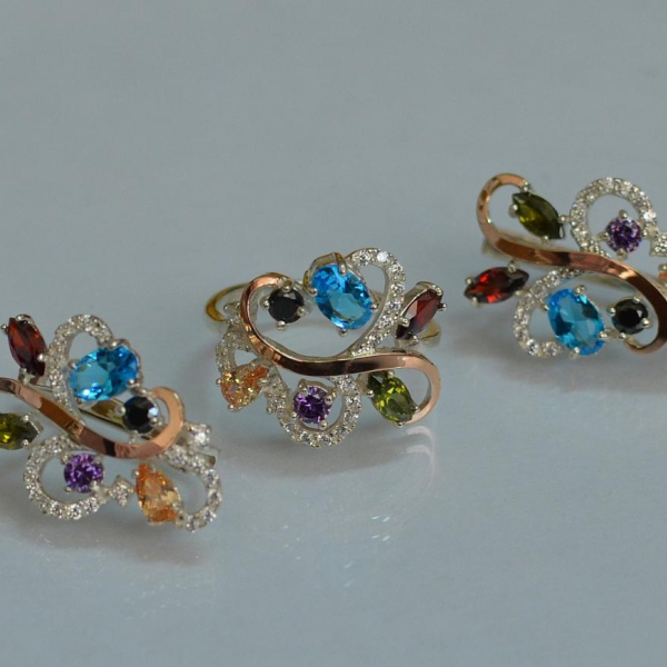 Срібний набір з золотими пластинами