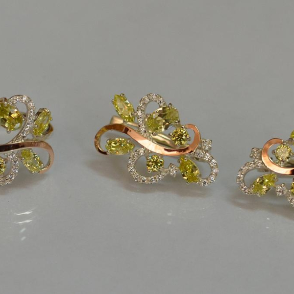 Срібний набір з золотими пластинами