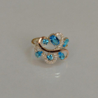 Срібна каблучка з золотими вставками